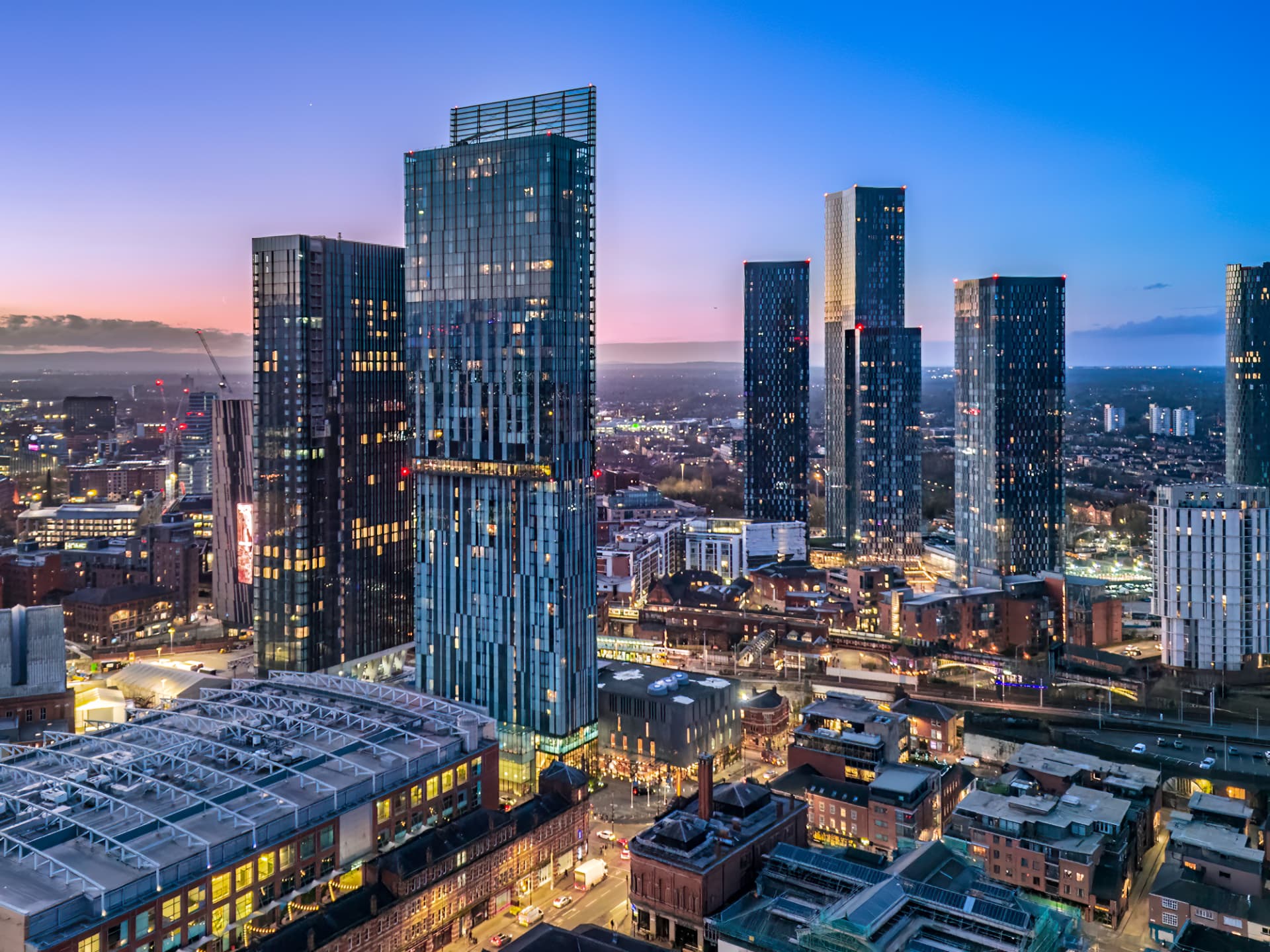 Aerial view of the Manchester skyline at dusk